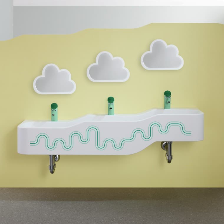 Geberit Bambini orman yeşili ve açık yeşil renkte oyun ve tuvalet alanı Geberit Bambini orman yeşili ve açık yeşil renkte oyun ve tuvalet alanı